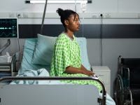 Young african american person sitting on hospital ward bed home Home young african american person sitting on hospital ward bed pibjtpu5yvv4050wunh775h9t9jdu0em195bqxlof0