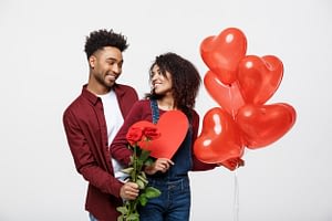 our services Our Services young attractive african american couple dating with red rose heart balloon 1258 2727 300x200
